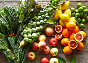 a group of fruits and vegetables on a wood surface Healthy Weight Loss Diets Kensington and Chelsea